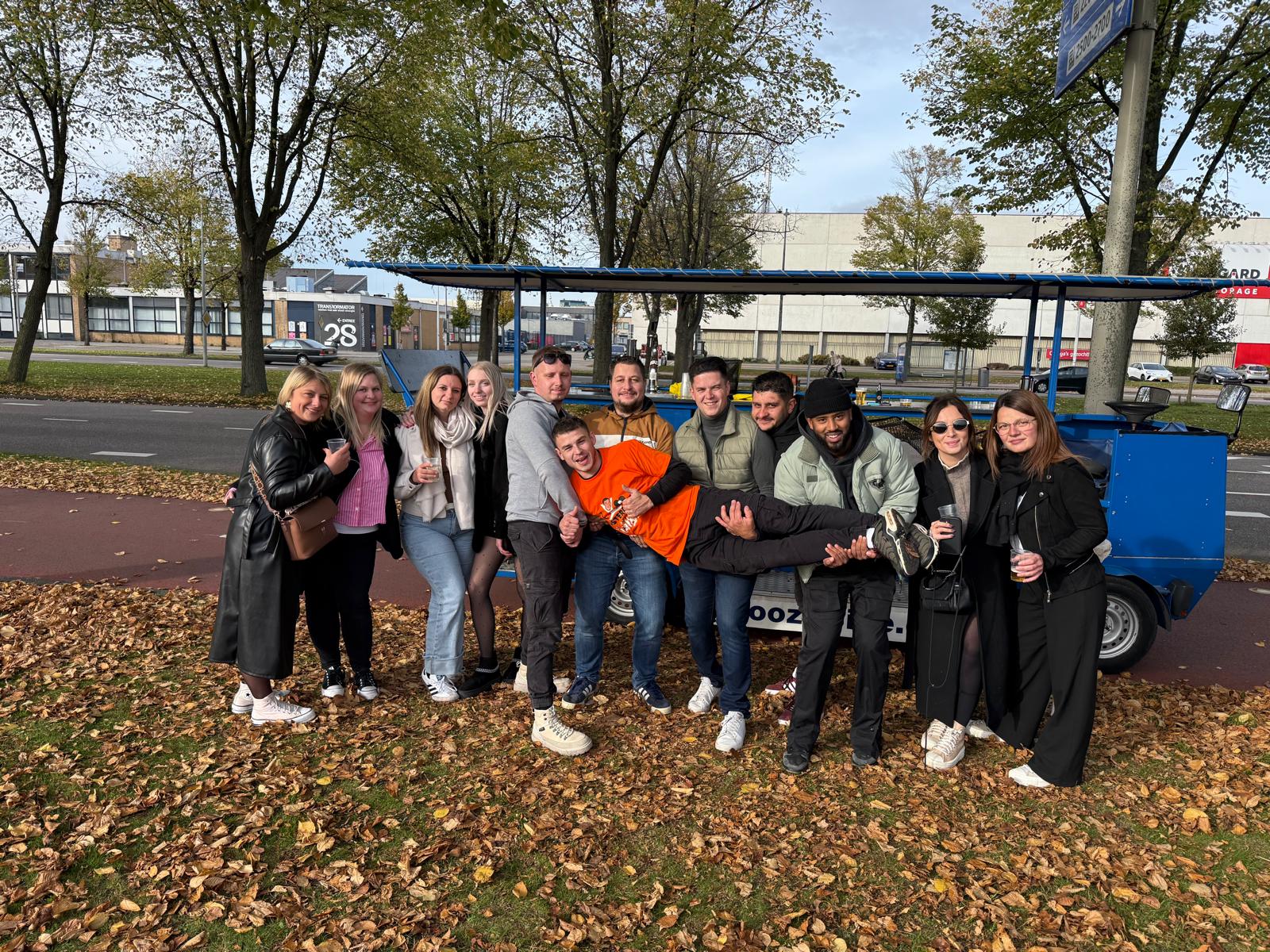Beer bike riding through a Dutch town