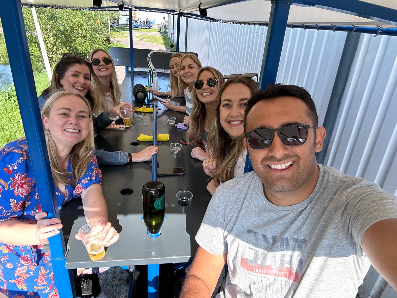 Group selfie on the beer bike